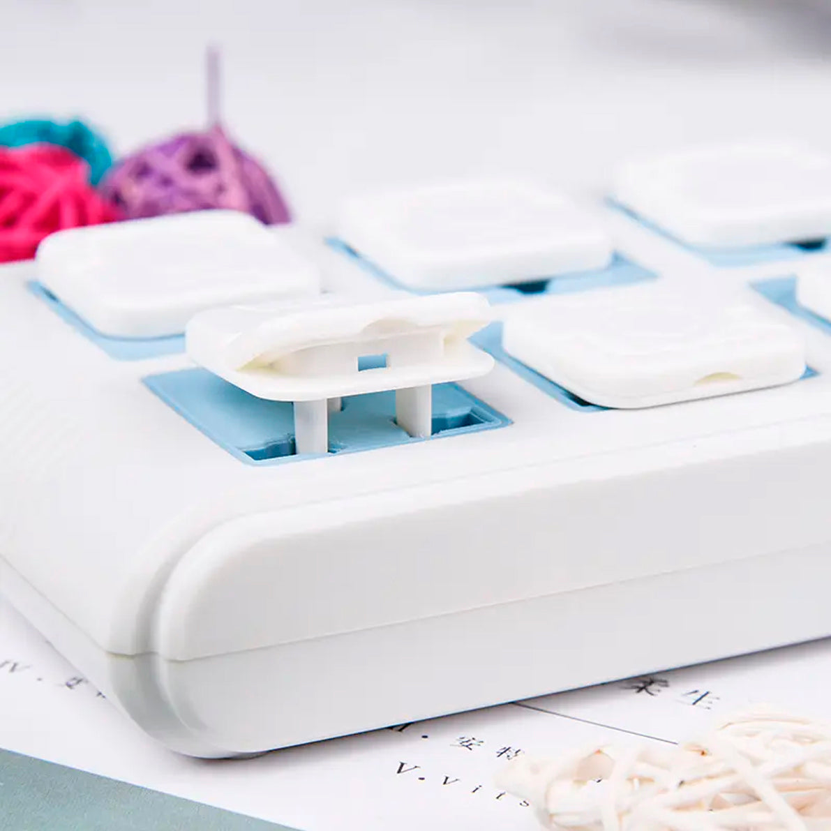 Protector seguro para toma corriente